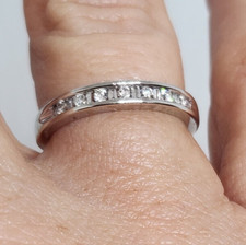 Gorgeous 10K White Gold 1/4cttw Baguette and Round Diamond Channel Band