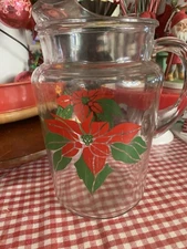 vintage glass Christmas pitcher 8 tall,4 wide and approx. 6 deep