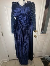Size 22 dress with a corset. Has beautiful lace sleeve NWOT!