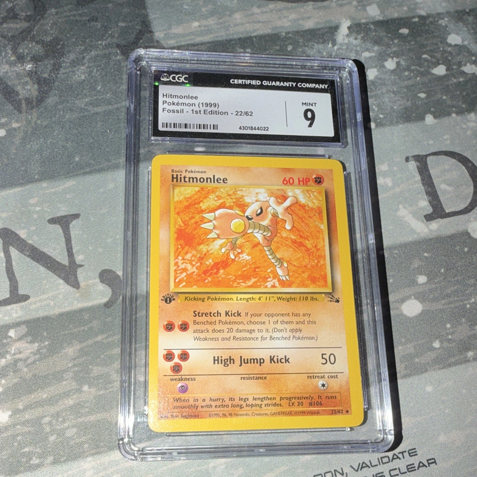 Pokemon TCG Hitmonlee 22/62 Fossil 1st Edition CGC 9 Rare Regular EN 60HP