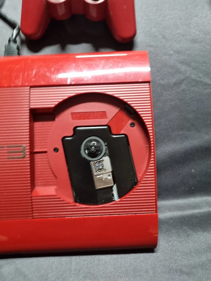 Sony Playtation 3 PS3 Super Slim Granate ROJO Con Mando 500 GB Foto 2 de 3