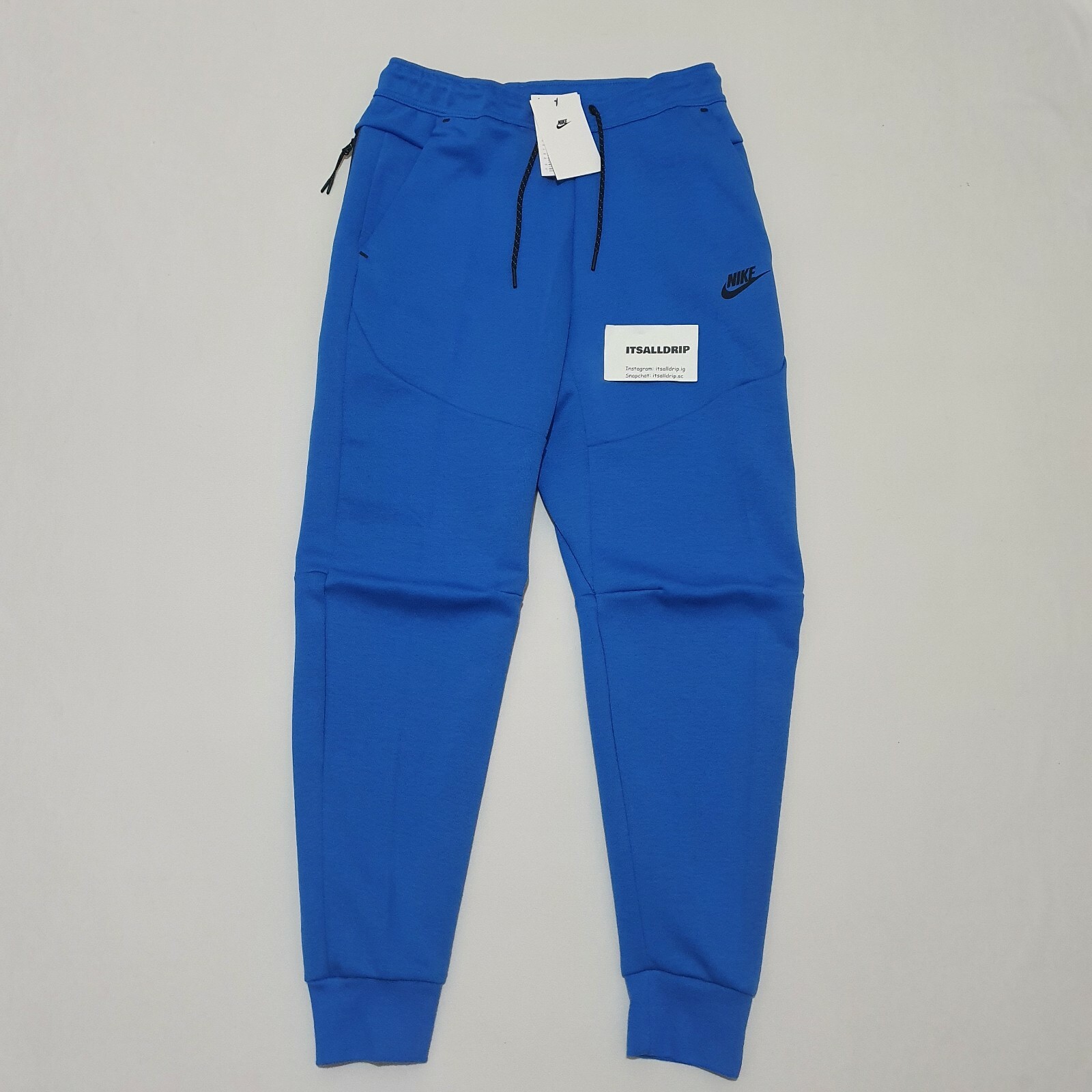 nike tech fleece signal blue tracksuit