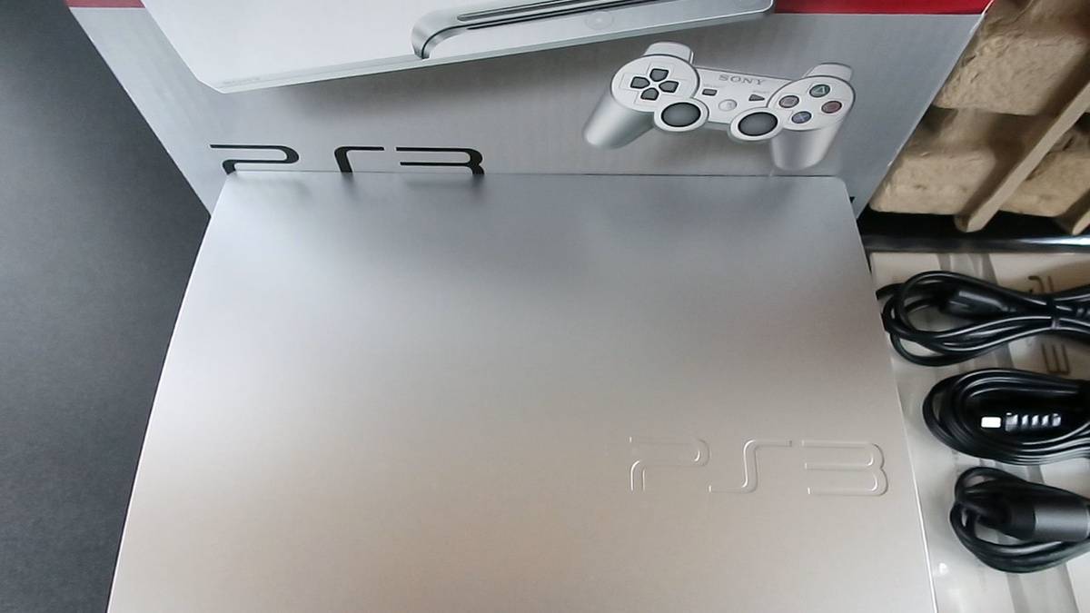 Sony PlayStation 3 Slim Launch Edition 320GB Satin Silver Console