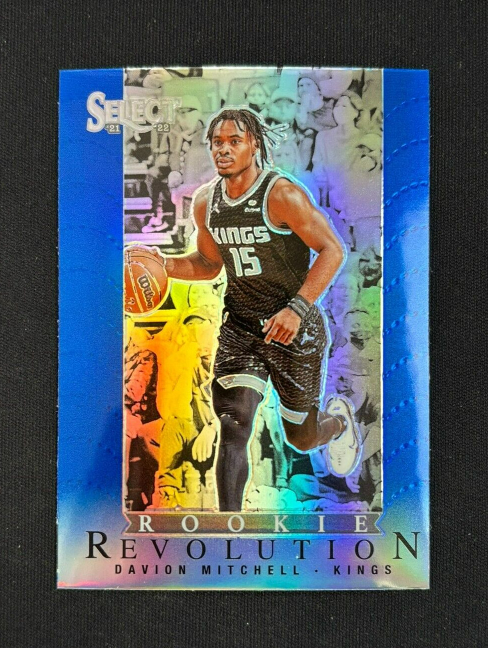 2021-22 Panini Select NBA Davion Mitchell Rookie Revolution Blue PRIZM #26 Kings