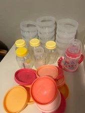 Lot of 14 baby food jars, milk storage bottles, nuk sippy cup pink with lids
