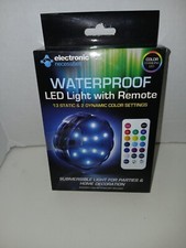 New In Box Waterproof Color Changing LED Light With Remote