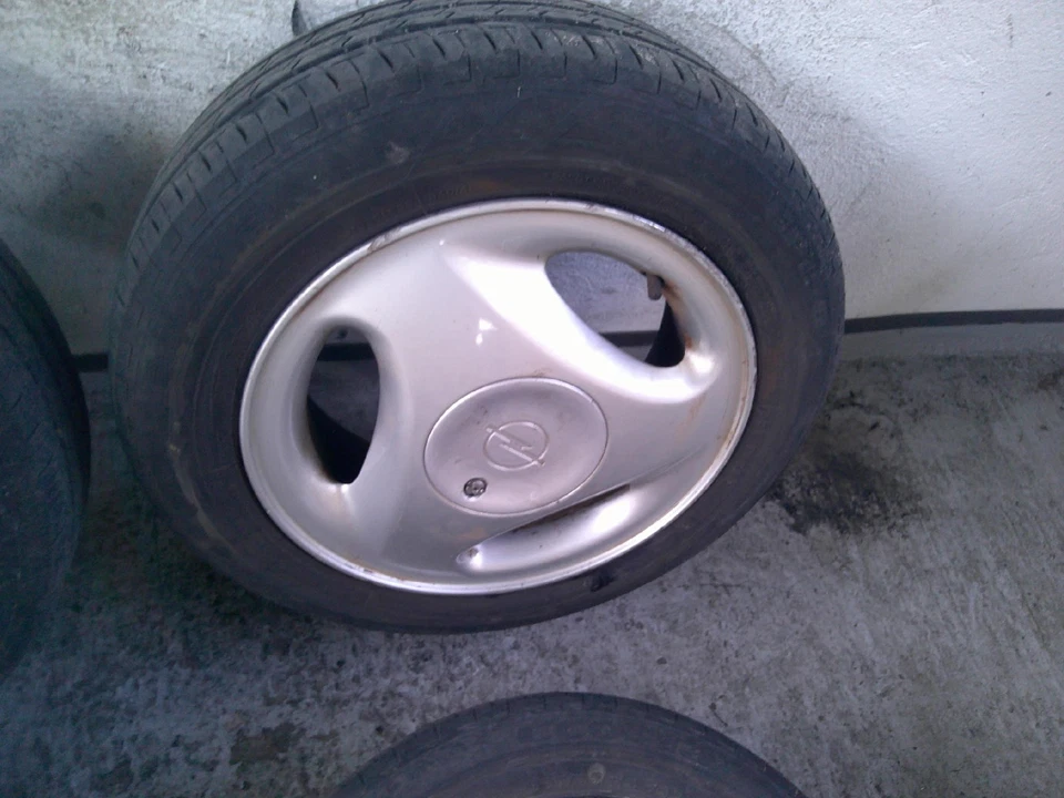 Opel Corsa B Alufelgen Radsatz Sommerreifen 165/65 14 Zoll 79S 5,5J x14 ET49 - Bild 4 von 4