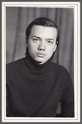 Handsome young man good looking boy teen Neat hair Studio portrait Russian photo