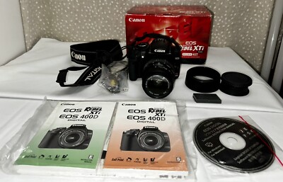 Preowned CANON EOS REBEL XTi with EFS 18-55mm f3.5-5.6 lens- READ