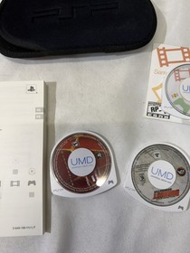 Sony PSP 1001 PlayStation Portable With Charger, new battery and 2 games.Works!!