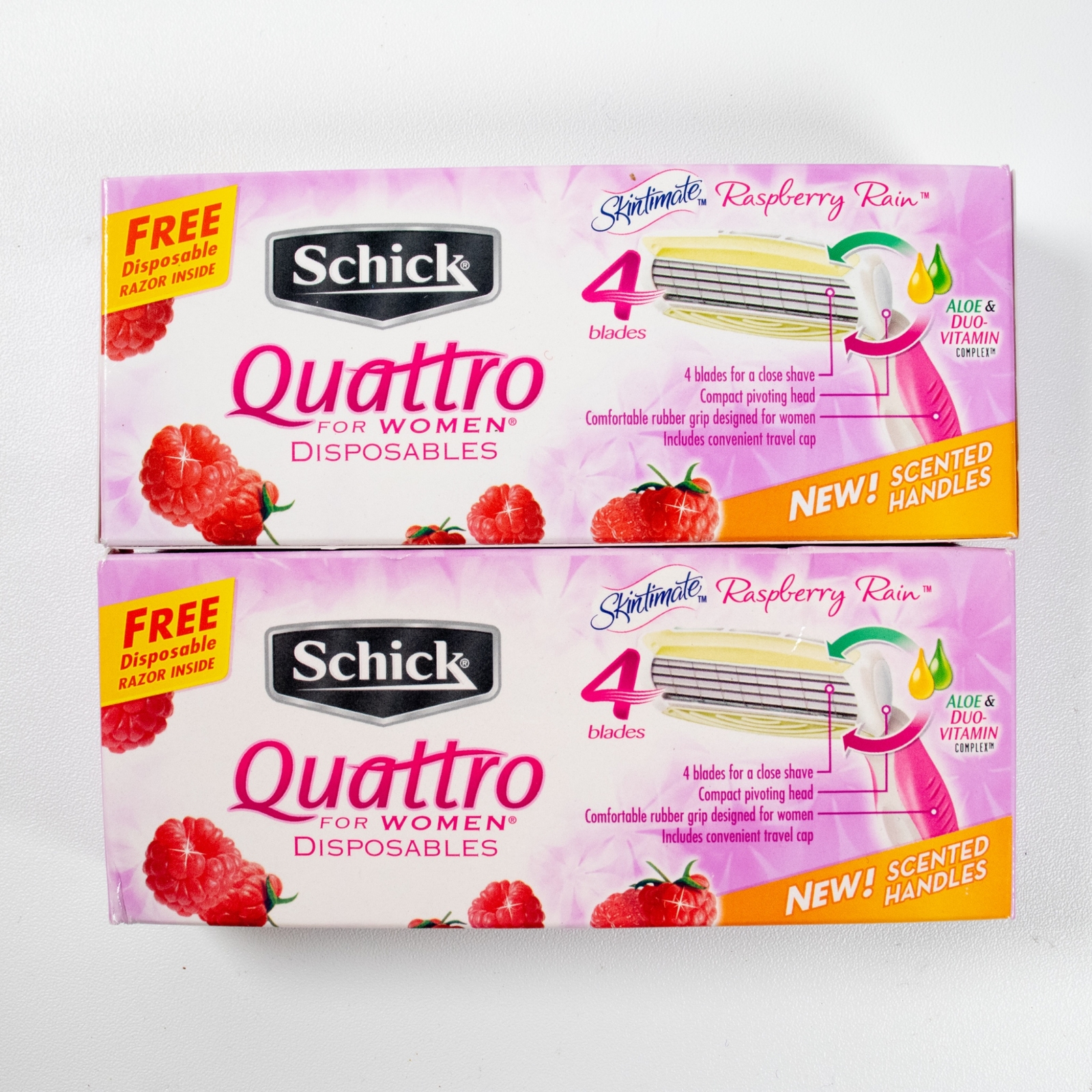 New Schick Quattro Skintimate Raspberry Rain Razors 2 Razors New in Box 4 Blades