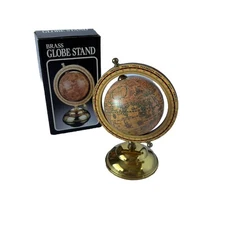 Small tabletop Old World globe in pink with meridian & brass accents from Taiwan