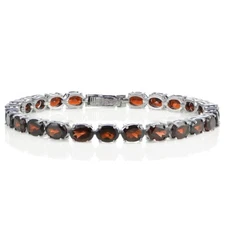 Sterling Silver 19ct Garnet 7x5mm Oval Tennis Bracelet