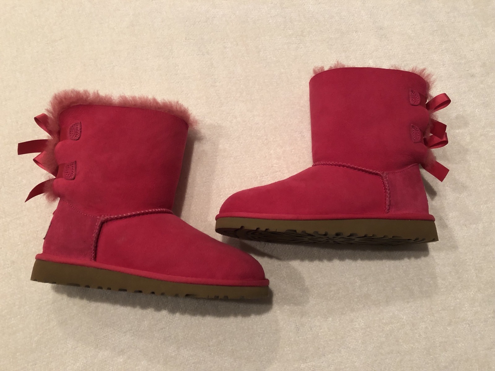 UGG AUSTRALIA BAILEY BOW CERISE HOT PINK SHEEPSKIN BOOTS SIZE 3 YOUTHNEW eBay