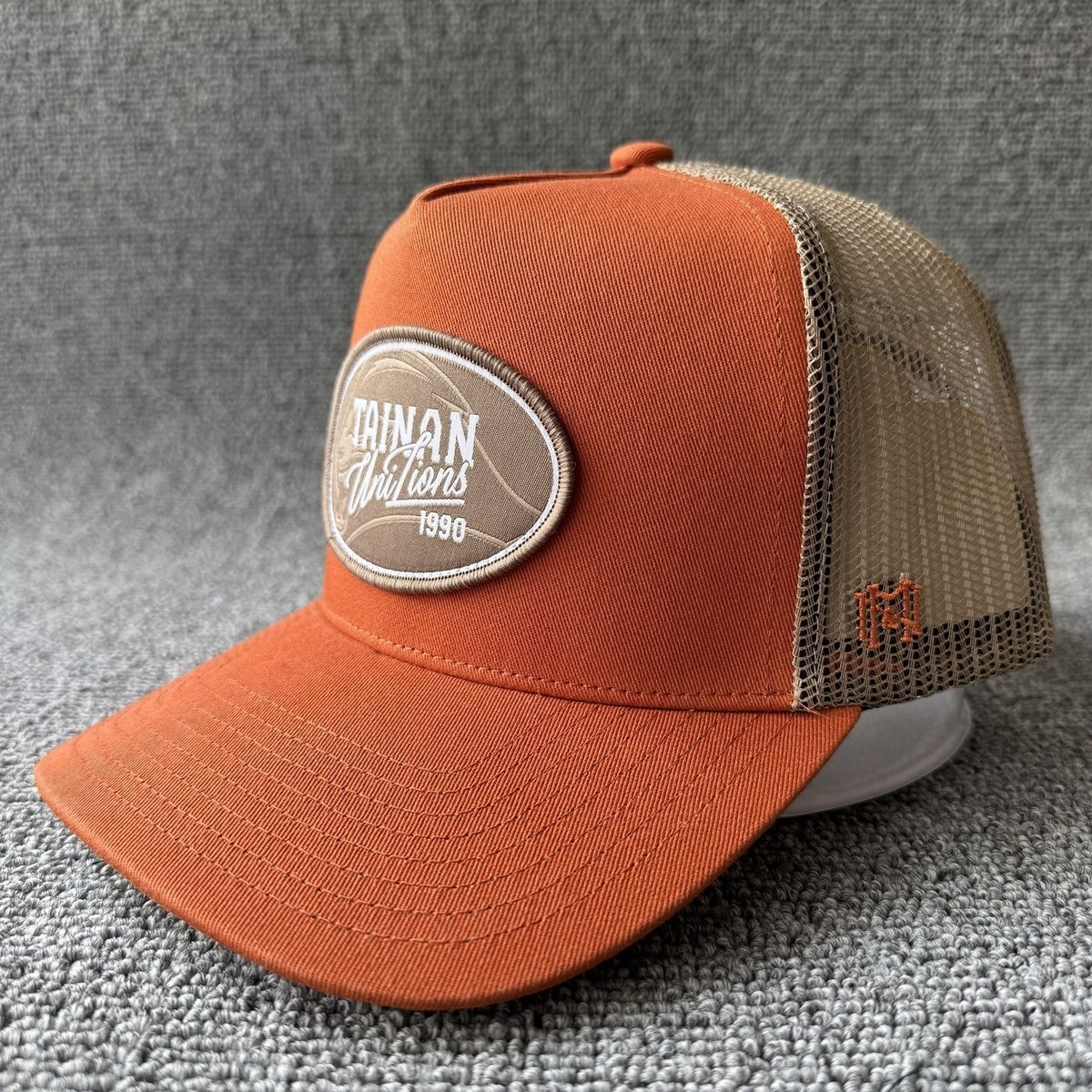 Mitchell & Ness Tainan UniLions Trucker Snapback Rust Orange Hat