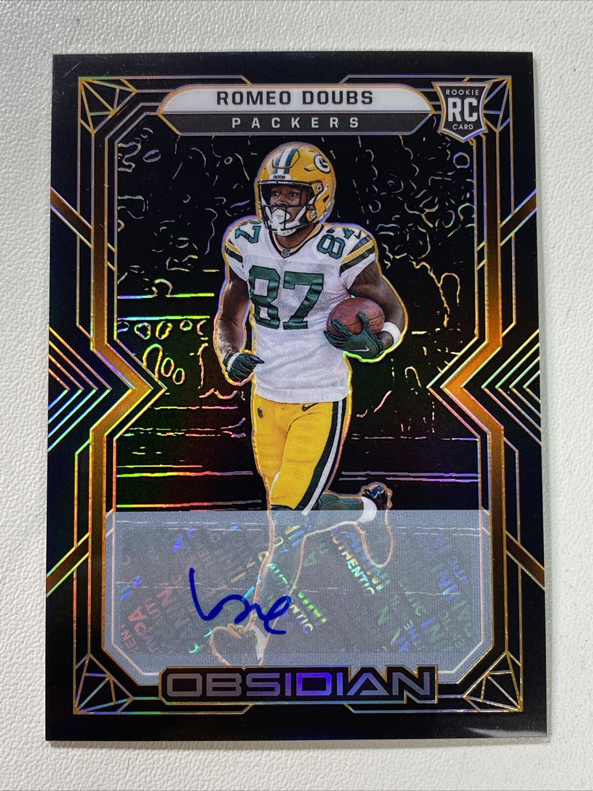 2022 Panini Obsidian Electric Etch Orange #140 Romeo Doubs RC Rookie AUTO /75