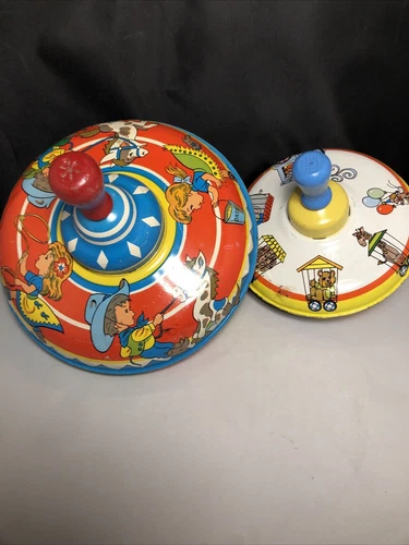 Two Vintage 1950s Ohio Art Tin Spinning Tops Cowboy Cowgirl  and Circus Train