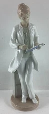 2001 Roman, Inc. Valencia Collection Doctor Nurse Statue Figurine 10" H