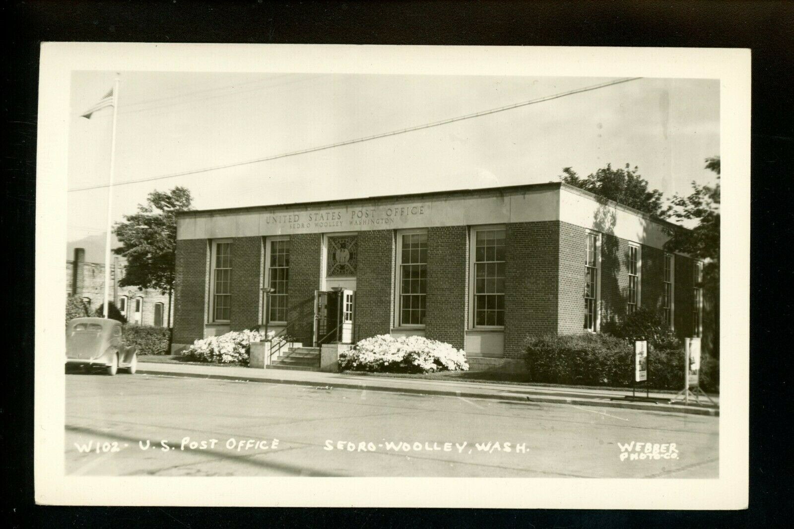 Post Office postcard Washington WA Sedro Woolley flag recruit sign Real