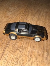 AFX TOMY Firebird HO Slot Car black Runs Lighted