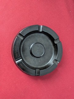 A Vintage World War II era Black Bakelite Ashtray stamped NAAFI