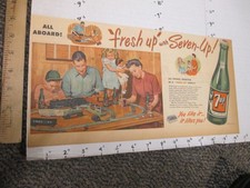 newspaper ad 1948 7 UP soda bottle toy train set Lionel American Flyer family