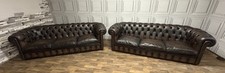 chesterfield  sofas a matching pair of 3 seaters in antique sable brown
