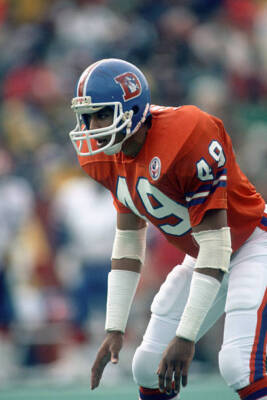 Defensive back Dennis Smith Denver Broncos looks on from the field- Old Photo