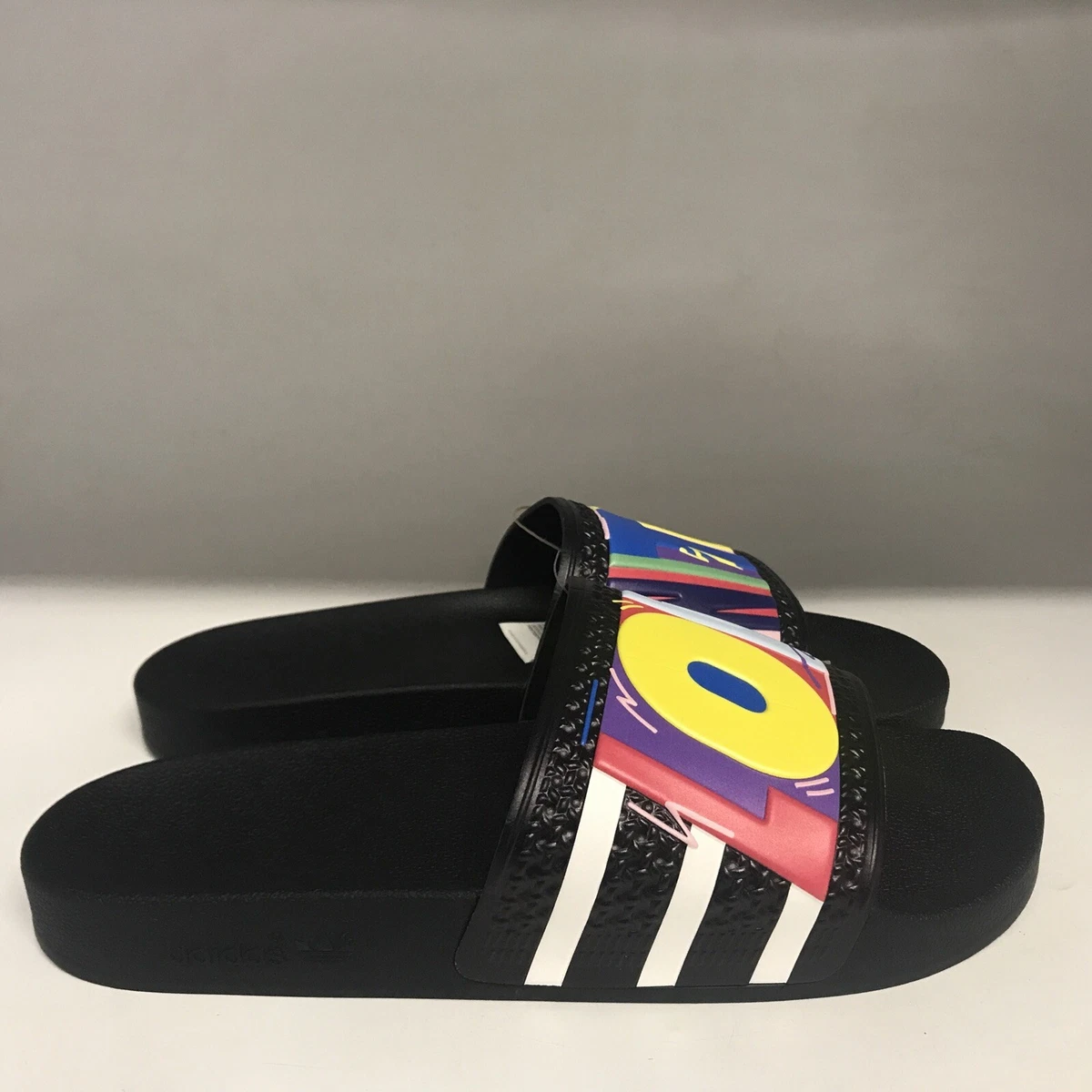 Adidas pride hotsell flip flops