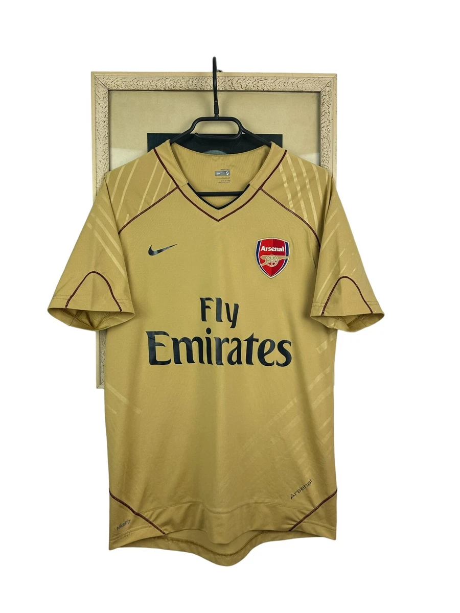 Preços baixos em Nike Arsenal Gold International Club fã de