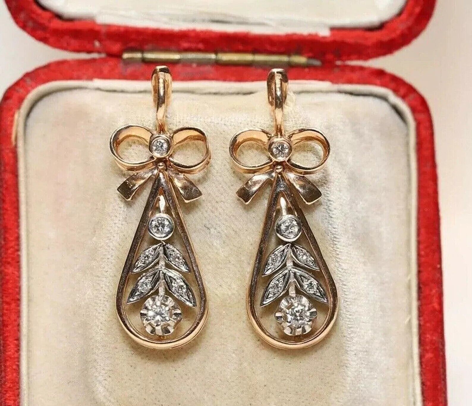 Round Cut Simulated Diamond Dangle Earrings in 14K Rose Gold Plated Silver