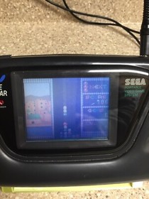 Sega Game Gear With Display Stand and Mystery Game