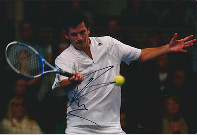 English tennis player Tim Henman playing a game of tennis in Londo- Old