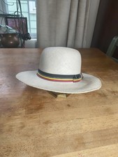 Vintage white straw sun hat with colorful striped ribbon