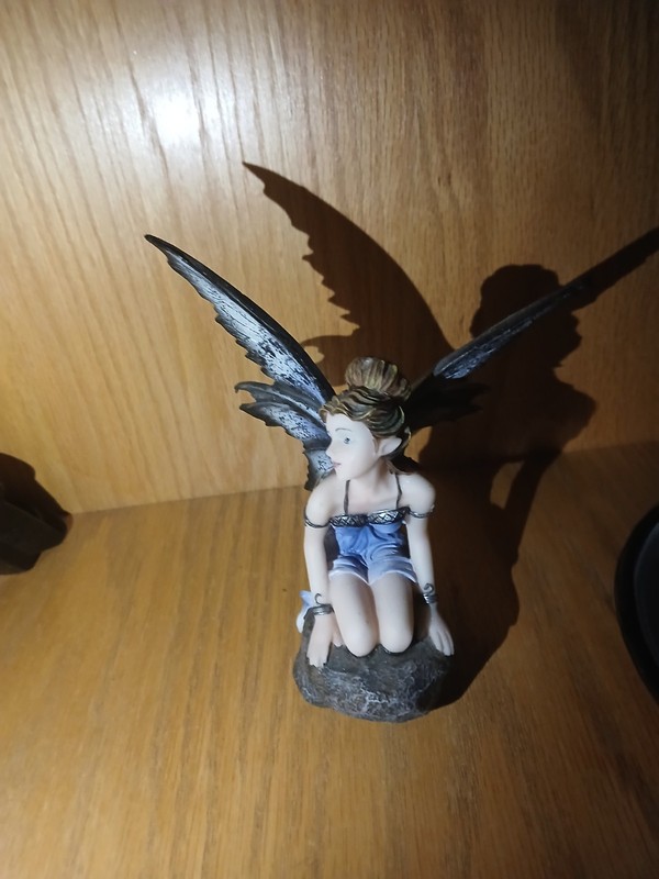 Seated Winged Fairy Figurine Statue, Blue Dress, Black Wings, Rock Base
