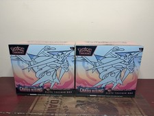 Lote de (2) Cajas Entrenador Pokemon Center Chaos Rising Elite - DAÑOS MENORES EN LAS ESQUINAS