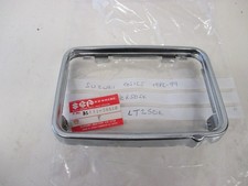 NOS SUZUKI LT250R QUADRACER ATV GS125 ZR50 HEADLIGHT HEADLAMP RIM 35111-36510