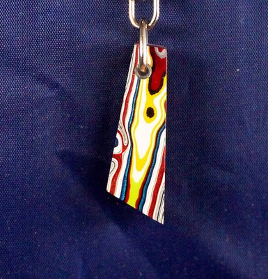 Fordite Keychain - 35.42mm x 13.03mm x 6.92mm     (2770)