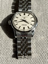 Grand Seiko SBGW005 - B&P, Cream Dial, Blued Second Hand, Beads of Rice Bracelet 12