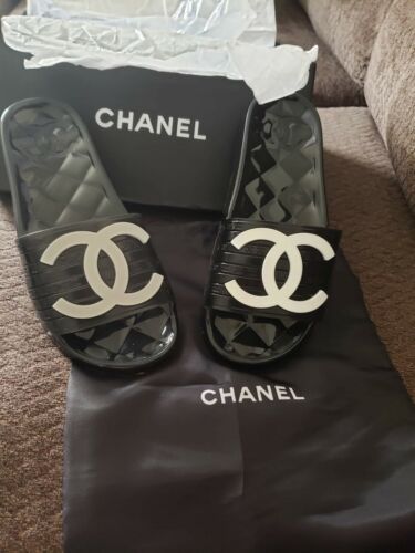 Chanel Black & Ivory Camellia Jelly Sandals - Preowned Chanel Sandals –  Love that Bag etc - Preowned Designer Fashions