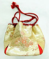 gold and red floral drawstring bag