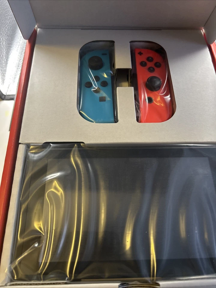 LEER ANUNCIO Consola de Videojuegos Nintendo Switch con Joy-Cons Azul y Rojo Nueva Foto 2 de 2