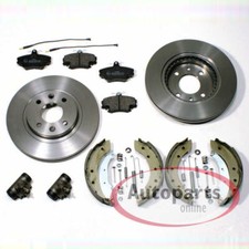 Bremsscheiben Beläge vorne + Bremsbacken Radzylinder hinten für Renault Clio II