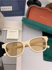 Gucci Women  s Oval Sunglasses Ivory Plastic Frame Brown Tinted Plastic Lenses