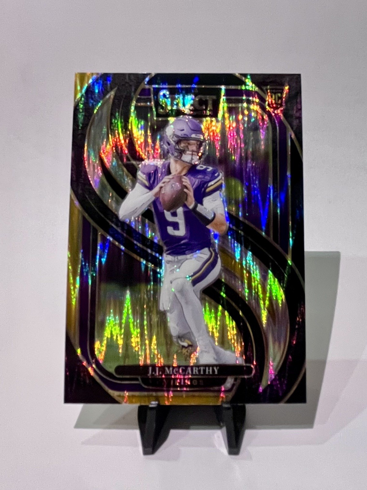 2024 Select JJ McCarthy Black And Gold Shock Prizm #134 RC Minnesota Vikings