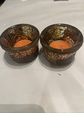 Pair of mosaic glass tea light candle holders.