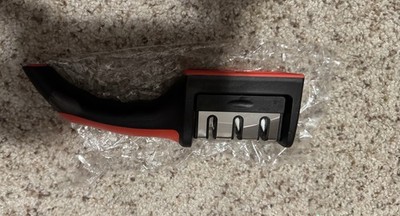 Handheld Kitchen Knife Sharpener New In Package. Never Used. Easy To Use.