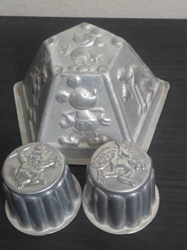 Rare 1930s Daniel Agnew Pentagon shape Aluminum Jelly Mold w/ Disney Characters