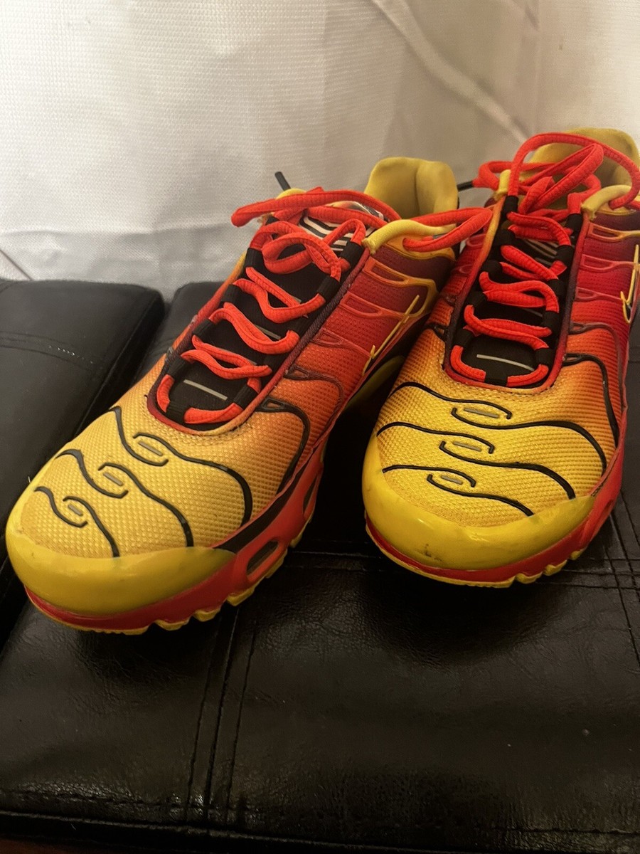 nike red and yellow trainers