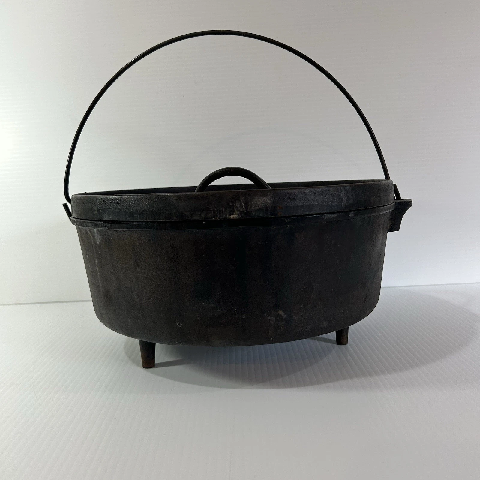 Vintage Unmarked Lodge #12 CO D USA Cast Iron Pot Camp Dutch Oven 3 Footed Lid
Opens in a new window